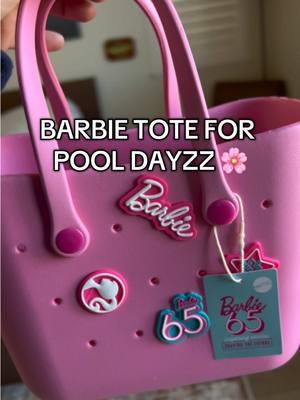 This plastic Barbie tote purse is EVERYTHING. So cute for my mom pool days the rubber is perfect for pool or beach! #plastictote #plasticpurse #barbietotebag #totebags #poolbag #poolparty #barbie 