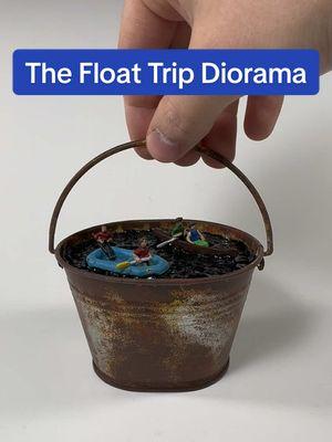 “The Float Trip” Diorama in a small bucket. #miniature #artist #raft #diorama #water #foryoupage #mini 