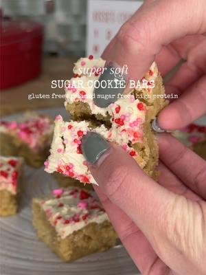 ‼️Full detailed recipes can always be found on my blog (linked in bio) ❤️ https://cookingkatielady.com  Valentine’s Day Protein Sugar Cookie Bars 🌹💕❤️ There are not enough words to describe how good these are 😍 ❤️Be sure to like and save this recipe & follow @cookingkatielady for more easy and healthy recipes  👩🏻‍🍳INGREDIENTS: For the base: 2 cups organic almond flour 30g vanilla protein powder 1/3 cup monk fruit 1 1/2 tsp baking powder 1/4 tsp salt 🧂  4 tbsp organic coconut oil (softened) 4 tbsp Greek yogurt (plain, nonfat) 2 organic eggs 🥚  1 tsp vanilla extract For the frosting: 4 oz. organic cream cheese (softened) 15g organic vanilla protein powder (I use @truvani) sprinkle of monk fruit sweetener 1/4 tsp vanilla extract 2-3 tsp unsweetened almond milk 🥛  👩🏻‍🍳INSTRUCTIONS: Preheat your oven to 325°F & line a 9x9 inch baking dish with parchment paper. In a large bowl, whisk the dry ingredients then add in the wet. Mix until fully incorporated. Spread the batter in your dish and bake 20 to 25 minutes. The center should be puffed up & the edges should be golden brown. It will still be very soft and that’s ok! Allow to cool. In a medium bowl, beat the frosting ingredients together until smooth. Spread frosting over the cooled bars. Refrigerate for at least 30 minutes to allow the bars & frosting to set. Cut into 16 bars and enjoy.  Approx. macros per bar: 148 calories 12g fat 4g carbs (2 net) 7g protein gluten free | grain free | high protein | low carb  #sugarcookies #valentinesdayrecipes #ValentinesDay #proteinbars #glutenfree #proteinsweets #sugarcookie #highprotein 