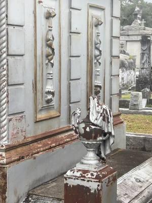 Alchemy relected in silver: The beauty and magic of Iron marries the power in its transformation.  There are a bakers dozen of these full iron tombs in New Orleans cemeteries and tens of thousands of iron coffins. Iron protects body and soul!  #iron #tomb #coffin #alchemy #cemetery #taphophile #tour #neworleans #ghost #tour #spooky #voodooqueenbloodymary #witchy