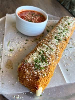 ✨ This massive mozzarella stick weighs an impressive 1.25 lbs! Pair it with their homemade marinara sauce for an epic cheese pull experience! 📍 @UrbanFieldPizza Longmont, CO #denver #denvercolorado #mozzarellasticks #viralfood #longmontcolorado #exploredenver 