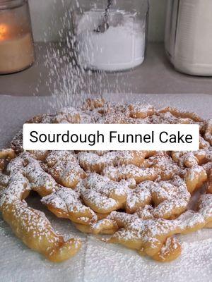 Sourdough Funnel Cake, also known as Dribble Cake. You know those smells that bring back memories? The smell and taste of these take me back to summer time and the county fair ☺️ #sourdoughfunnelcake #funnelcake #dribblecake #funnycake #sourdough #sourdoughdiscard #discardrecipes #carnivalfood #fairfood #friedfood #sourdoughrecipe 