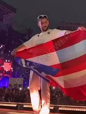 Unforgettable moment 🇵🇷❤️ When Bad Bunny unfurls the Puerto Rican flag, you can feel the love, pride, and passion he has for his island. It’s more than music—it’s a movement, a legacy, and a reminder of where we come from.  Viva Puerto Rico! 🌴 ✨ #PrideOfPuertoRico #BadBunny #IslaDelEncanto #BoricuaPower #PuertoRicoEnElCorazon #OrgulloBoricua #BunnyForPR #PuertoRicoStrong #BendicionPuertoRico #LatinoPride #puertorico  #prstrongwepa  @badbunnypr 💯🇵🇷