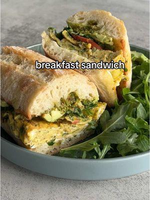 breakfast sandwich of my dreams 😋 toasted ciabatta with fresh mozzarella, homemade pistachio pesto, herb omelette, avocado, tomatoes & arugula with flakey salt & black pepper #breakfastsandwich #pestoeggs #EasyRecipes 