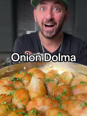 Onion dolma or is it onion sarma? Onions stuffed with delicious seasoned beef and rice. This is my new favorite type of dolma. The onions really add so much extra flavor and it’s actually not that difficult to make since the onions petals kinda roll themselves.  . I’m sure this has a different name, what is it called?  . 4 medium onions  1 lb ground beef or lamb 1/2 cup rice 2 Tb pepper paste 2 Tb tomato paste 2 tsp salt 1 tsp pepper 1/2 tsp all spice 1/4 cup chopped parsley 1/4 cup chopped mint  1/2 cup tomato sauce or puree  1 lemon juiced . Peel the outer layer of the onions. Cut a slice halfway through from tip to stem. Place it into salted boiling water for 10-12min. Remove and shock in ice water. Carefully peel each layer of the onion and set aside. In a bowl add beef, rice, pepper paste, tomato paste, salt, pepper,all spice, parsley and mint in a bowl and mix. Take a heaping tablespoon of the mixture and place it at the bottom of each onion petal and roll it tightly, continue until you are out of filling. In a large pan place all the dolma seam side down fitting snug. Top with a little olive oil, tomato sauce and a cup of water. (You want the water about halfway up the onions) bring to a simmer, cover and cook for about 45min or until the rice is fully cooked.  . Hats @crownminded  . #chefarazada #abowww #abowwwguy #onion #oniondolma #dolma #sarma #stuffed #stuffedvegetables #stuffedfruit #stuffedonions 