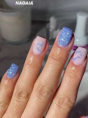 The baby blue shimmering must be my fav well paired with the creamy pink 💕💗 cutest heart shape nails dipping 💅✨ #shimmernails #bluenails #glitternails #dipnails #nudenails #NailTutorial #dippowder #bluenail #dippowdernails #nailsdipping #heartnails #cutenails #valentinenails #nagaiadipkit #thenagaia #fyp 