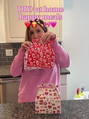 I love creating little traditions with my kids, and our at-home Happy Meals have become a favorite! 💕 For Valentine’s Day, I went all out with heart-shaped nuggets, fries, apple slices, apple juice, a fun toy, and a cake pop. They get so excited every time we do this, and I love coming up with new themes for every holiday and season. I have everything in my storefront!🎀❤️ #valentinesdaytraditions #ValentinesDay #momof4 #mommagic #seasonalfun #momlifehacks 