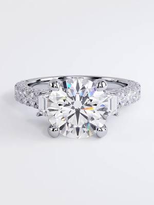 Just ✨….🥰 5.00ctw GIA Certified D-VS2 Round Brilliant Micropavé Three Stone Lab Grown Diamond Engagement Ring 14k White Gold. A classic micropavé three stone diamond engagement ring set with 3 Carat Round Cut Lab Grown Diamond. 3.00ct Round cut D Color & VS2 Clarity GIA Certified. This unique setting is made of 2.00ct F color and VS clarity micro pave set in 18kt white gold. While the suggested price is set in 18k white gold, you are more than welcome to inquire for a quote within 14k, 18k in Yellow / Rose / White Gold or Platinum. This ring is a handmade piece and can be made into any size needed, please get in touch with your special request. Check the link in bio and search for ER-1645…🥰 ONLY $8,950 https://lioridiamonds.com/products/4-08ctw-gia-certified-f-vs1-round-brilliant-nder-halo-trio-micropave-lab-grown-diamond-engagement-ring-14k-white-gold #lioridiamonds #liorilover #roundbrilliant #labgrowndiamonds #giacertified  #diamondring #diamondrings #3carat #14kwhitegold #micropave #roundcut #14k #engagementring #engagement #colordiamond #giftsforher #diamonddistrict #nyc #luxurylifestyle #luxuryjewelry #finejewelry #weddingring #💎 #💎💍 #vs2 