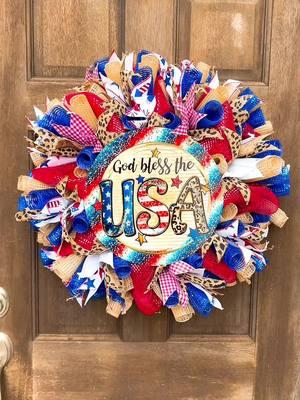 🇺🇸✨ We’re excited to showcase our stunning God Bless the USA themed mesh wreath! 🎉  This gorgeous creation features a vibrant mix of patriotic ribbons, beautiful mesh, and even some playful leopard ribbons for a fun twist! 🦓❤️💙 It’s the perfect way to show your love for our country and add some festive flair to your home. Check out this eye-catching piece and let us know what you think! 🥳🎈 #GodBlessTheUSA #PatrioticDecor #MeshWreath #ThePerfectPieceTx #Wreaths #Fyp 