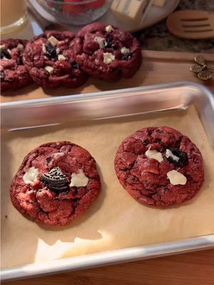 Red velvet Oreo cookies💌🍪✨                                   Recipe:                                                                             Ingredients -2 cups all-purpose flour (240g) -1/4 cup unsweetened cocoa powder, sifted (21g) -1 tsp baking soda -1/2 tsp salt -3/4 cup unsalted butter, room temperature (169g) -3/4 cup light brown sugar, packed (160g) -1/2 cup granulated sugar (100g) -1 egg plus 1 egg yolk, room temperature  -2 tsp vanilla -3 tsp red liquid food coloring -3/4 cup white chocolate chips, plus more for topping (128g) -11 oreos, roughly chopped  Instructions  1. Preheat oven to 350°F and line a baking sheet. 2. In a medium bowl whisk together flour, unsweetened cocoa powder, baking soda, and salt. 3. In a large bowl beat the butter, granulated sugar, and brown sugar until light and fluffy. 4. Add the egg, egg yolk, vanilla, and red food coloring and mix until combined. 5. Fold in the dry ingredients into the wet ingredients until just combined. 6. Fold in the Oreos and white chocolate chips. 7. Scoop the cookie dough with a 3 tablespoon cookie scooper and place the dough balls on the lined baking sheet. Top with more Oreos and white chocolate chips. 8. Bake 10-12 minutes. Leave the cookies on the baking sheet for about 5 minutes and then transfer to a cooling rack to cool completely. #whitechocolate #redvelvet #oreo #cookies #baking #Recipe #bakingtiktok #bakingvideo #dessert #bakingideas #desserttiktok #foryou #bakingtherapy #baketok #fyp 