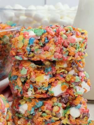 Yabba Dabba Delicious Fruity Pebbles Marshmallow Treats. Google “two sisters fruity pebbles marshmallow treats” for the full recipe.  #ricekrispiestreats #fruitypebbles #fruitypebblestreats #easydesserts #desserttiktok #twosisterscrafting 