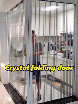 Crystal folding doors can isolate the cooking fumes from the kitchen, prevent the air conditioning in the living room from leaking to the stairs, protect the door, and save space #foldingdoors #pvcdoor #partitiondoor #pvcfoldingdoor #aluminum #factory #deco #tottme #chinawindoors