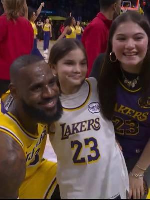 LeBron James takes a photo with the young fan who was emotional to watch him live front row in person 💜💛 #HeatVsLakers #Lakeshow #Lakers For more Lakers content follow: @lakers_legacy_legends #lakerslegacylegends #l3