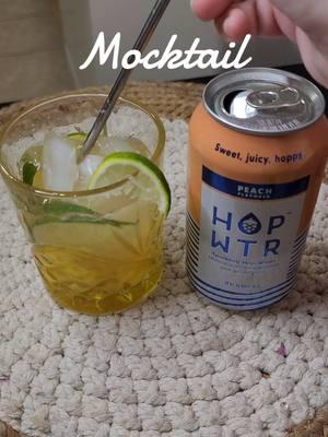 such a great low calorie mocktail for dry January #hopwtr #hopwater #sparklingwater #watertok #dryjanuary #tiktokshopaffiliate #happynewyear #viraldrink #wateroftheday #mocktailrecipe #viraltiktokshop #ashwaganda #sleepygirlmocktail #healthychoices #peachbellini #mangodrink #nighttimedrink #sleepymocktail 