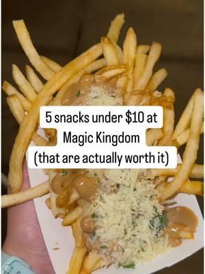 What’s your fav snack at MK? i’m still thinking about those fries tho 🤤  #magickingdomsnacks #5snacksunder$10atdisney #waltdisneyworld #cheapsnacksinwaltdisneyworld #disneyfoodtastetest #whatieatinaday #whatispentindisney #disneyland #trending #fyp #viral #themeparksnacks #disneysnacks 