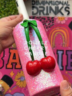 On a scale of 1-10, how much do you love this Double Cherry Handle? 🍒 Get this and an assortment of other cute DIY tumbler handles at Dimensional Drinks 🥤  . . . . #tumbler #3dtumbler #DIY #DimensionalDrinks #3DTumblers #tumblerartist #tumblermaker #tumblersoftiktok #crafter #crafting #3dtumblerstiktok #glittertumblers #customtumbler #fakefood #cherry #ValentinesDay #valentinesdaygift #ValentinesDay 