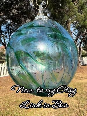 New to my Etsy✨✨Add a touch of mystical elegance to your home decor with this exquisite hand-blown art glass Witch's Ball Hanging Ornament. #HappyGirlThrift #WitchesBall #Orb #Witch #Magical.