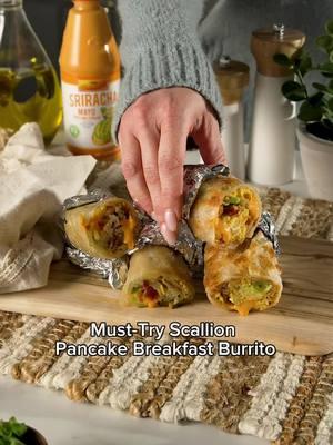 🌞 Wake up to a breakfast that’s as bold as you are! This Scallion Pancake Breakfast Burrito is loaded with scrambled eggs, crispy bacon, and a drizzle of Lee Kum Kee Sriracha Mayo – a spicy twist on your classic breakfast burrito. Ready to spice up your mornings? 🌯🔥 #leekumkee #leekumkeeusa #breakfastburrito #breakfastideas #breakfastrecipe #srirachamayo #breakfasttime #eggs 