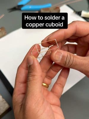 Learn how to solder a cuboid using 20AWG copper wire! This simple technique can also be used with brass and is perfect for creating shapes for sculptures. I use this design in many of my creations—watch the reel for the full process and let me know if you have any questions! #SolderingTips #WireArt #CircuitSculpture #DIY