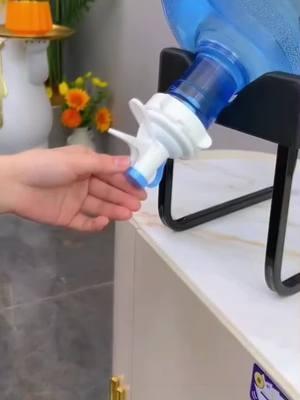 "Need a place for your bottled water? Try this convenient water stand with a built-in faucet – so easy to pour, no more hassle! Perfect for your home or office. 🥤 #WaterStand #HomeEssentials #MustHaveProducts #PracticalHome #ConvenienceIsKey #DrinkWaterMadeEasy #OrganizedLiving #LifeHacks #WaterDispenser #HomeOrganization"