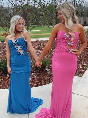 Give me two of these dresses!🩷💙🎀 #prominspo #trending #tend #foryoupage #fyp #SmallBusiness #viralvideo #promdress #prom2025 #glitzandgowns #viral #shoppinghaul #newyear2025 #promtok #stunningdress #dress #floraldress #mediadays #bowdress #inspo 