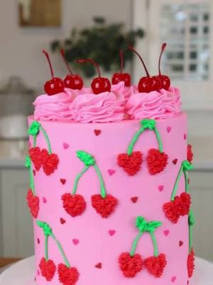 STOP and watch for my favorite cake decorating technique.  A small cookie cutter is such an easy way to create a fun design.  Once you’ve outlined your shape, fill with buttercream using a @Wilton Cakes 18 tip. #cake #cakedecorating #baking #pinkcake #valentine #ValentinesDay #cherries #cakesoftiktok #baking #wilton 