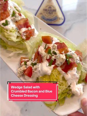 #ad If you are looking for a showstopping recipe for entertaining, then I got you!   This @Treasure Cave Cheese Wedge Salad with Crumbled Bacon and Blue Cheese Dressing is a crowd pleaser and has a stunning presentation. I used the new Treasure Cave Mild Blue Cheese Wedge in my homemade dressing and it was amazing. I noticed it has an even creamier, smoother texture and is of course, a more mellow taste than traditional blue cheese. It’s available in both wedges and crumbles so it’s versatile for different recipes and is available at retailers nationwide.   If you make this salad, tag me and let me know what you think! Recipe below:   Ingredients: 3/4 cup sour cream 1 small garlic clove, grated 3 ounces Treasure Cave Mild Blue Cheese or any Treasure Cave Blue Cheese, crumbled and divided 1 tablespoon fresh lemon juice 1 tablespoon minced fresh chives 3 tablespoons milk salt and pepper to taste 1 head iceberg lettuce 4 slices bacon cooked and crumbled 10 cherry tomatoes, quartered   Make the dressing: 1. Add sour cream, chives, garlic, two ounces of Treasure Cave Mild Blue Cheese, and lemon juice to a small bowl. 2. Use a fork to combine the ingredients, smashing the blue cheese crumbles against the side of the bowl to infuse the sour cream with flavor. 3. Add milk and season to taste with salt and pepper.   Prepare the salad: 1. Cut the head of iceberg lettuce in half starting from the top and slicing down through the core. Then cut each half in half again so that each wedge has 1/4 of the core. 2. Carefully cut core from each while keeping the wedge intact and place on a serving plate. 3. Spoon desired amount of dressing over each wedge. 4. Sprinkle it with bacon, tomatoes, remaining Treasure Cave Mild Blue Cheese, chives, and fresh pepper. 5. Serve and Enjoy! #FueltheFunky #mildbluecheese #entertainingrecipe #saladrecipe #wedgesalad #bluecheesedressing #nhfoodie #bostonfoodies   @treasurecavecheese   Shop now —> https://click2cart.com/2232000E  