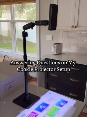 Answering common questions about my cookie projector setup! 🎥🍪 I use an Akaso projector with an Arkon Mount stand. Plus, the free projector templates I use are available on my website! ✨ #cookiedecorating #royalicing #cookieprojector #decoratingtips