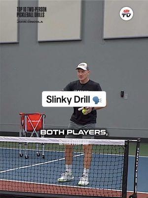 Pickleball pro @John Cincola Pickleball works with a partner on the Slinky Drill: to help you get the ball into the kitchen from anywhere in the court by adjusting your power level/how hard you’re hitting the ball 🔋 With this drill, you can work with a partner to hit the pickleball into the non-volley zone/kitchen every time you hit the ball 💯 #pickleball #pickleballislife #pickleballlessons 