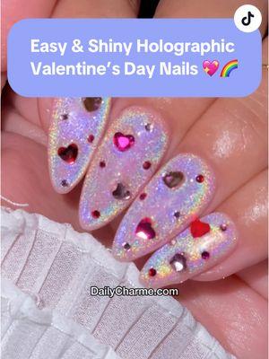 POV: You just found the shiniest holographic nails for Valentine’s Day 💖✨🌈  💅 Everything used for this look is from the brand Daily Charme & is listed below. All goodies are available now in our TikTok shop or via the 🔗 in bi0 💖 💅 Save & share to inspire your next Valentine’s mani! ✨ Using @daily_charme: 💖 Almond Medium Clear Charme Gel Extension Tips 💖 J01 Chiffon 💖 C07 Unikitty 💖 Charme Crystal Lovely Hearts Mix 💖 Charme Crystals "Fuchsia" & "Light Rose" 💖 Stay Put No-Wipe Chrome Jewelry Gel 💖 Crystal Pick Up Tool 💖 Diamond Shine Top Coat (HEMA-FREE) #valentinesdaynails #holographicnails #unikittynails #dailycharme #glitternails #chromenails #diynails #romanticnails #nailtutorial #nailinspo #trendynails #cutemanicure #gelnails #easynailart #nailarttrends #valentinesnailideas 