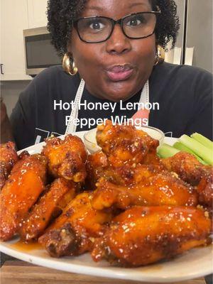 Hot Honey Lemon Pepper Wings.                   7 whole wings split  1/2 tbs Franks hot sauce @franksredhot  1/2 tbs low sodium All-purpose seasoning  @Pressie Mae’s                                  1/2 tbs garlic powder 1/2 tbs onion powder  1/2 tbs cornstarch  1/2 tbs lemon pepper  Sauce: 1/2 stick butter 1/2 cup hot sauce 1/3 cup honey  Blue Cheese/Ranch Dip: Blue cheese crumbles  Ranch dip seasoning mix Mayo Sour cream  Buttermilk  Dried dill weed *no precise measurements  #chickenwings #hothoneywings #superbowlfood #fyp #EasyRecipe #foodtiktok 