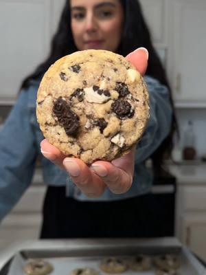 Recipe from @Maude 🍪🍫 * 	Cookies & Cream Cookies     * 1 cup unsalted butter* softened      * 1 cup granulated sugar      * 1 cup light brown sugar packed      * 2 tsp pure vanilla extract      * 1 large egg, room temp      * 1 large egg yolk, room temp      * 3 cups all-purpose flour      * 1 tsp baking soda      * 1/2 tsp baking powder     * 1 tsp sea salt      * 1 tsp cornstarch      * 1/2 cup white chocolate chips     * 10 oreos, chopped into pieces     * 1 (4.4 oz) Hersheys cookies & cream broken into small pieces   1. Mix together butter and sugars, make sure butter is extra soft, so you can easily mix. * 2. Add egg, egg yolk and vanilla. Mix on low speed until combined.  * 3. Mix all dry ingredients into a medium bowl.  * 4. Add dry ingredients to your butter and sugar mixture. Mix on low until flour is barely combined. Add oreos, chips and chocolate.  * 5. When ready to bake, preheat oven to 375. * 6. Using an ice cream scoop or large spoon, form dough into balls.  Place cookies on a baking sheet lined with parchment paper. Bake for about 10 minutes, or when edges are browning and tops look puffed up and underdone #onenewrecipeaweek #onenewrecipeaweekchallenge #onenewrecipeaweekseries #recipechallenge #cookierecipe #cookiesandcream #oreocookies #cookiesandcreamcookies #BakeWithMe #baking 