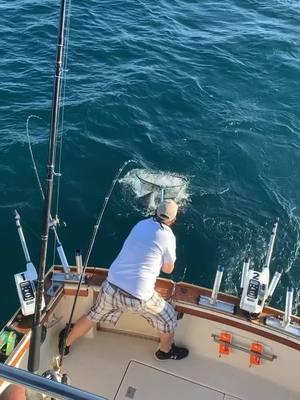 Haulin em over the rail on the daily! Sheboygan fishing charters at their finest! #salmon #trout #lakemichigan