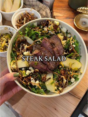 Steak Salad Sundays Part 51: Sliced pear and gorgonzola steak salad topped with crispy brussel sprouts, crispy onions, and sweet & spicy pecans made with my @Instant Pot Vortex Air Fryer #ad #steaksaladsundays  Ingredients: 1 cup spring mix 1 cup arugula Sliced steak Sliced pear Shaved brussel sprouts  Crispy onions Sweet and spicy pecans  Crumbled gorgonzola cheese Champagne vinaigrette Crispy onions: 1 onion, sliced thinly Salt and pepper, to taste.  Slice onion as thinly and even as possible. Toss with olive oil, salt, and pepper. Air fry at 300 degrees for about 20 min or until desired crispiness, checking in every five minutes or so.  Sweet and Spicy Pecans: 12 oz pecans 2 tbsp maple syrup ¼ cup brown sugar 3 tbsp sriracha Dash of cayenne Dash of cinnamon  2 tbsp melted butter Salt, to taste Toss all ingredients together until pecans are well coated. Air fry at 300 for about 10 minutes or until pecans are nice and toasted.  Brussel Sprouts: Slice brussel sprouts finely and toss with a little olive oil, salt, pepper, and lemon juice. Air fry for 5-8 minutes at 375 degrees, or until desired crispiness.  Champagne Vinaigrette ¼ cup olive oil 2 tbsp champagne vinegar 1 tbsp fresh orange juice 1 tbsp honey 1 tbsp dijon 1 tbsp green onions, diced  3 cloves garlic, minced  Salt and pepper to taste