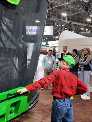 Jackson got to check out the @John Deere 9RX Autonomous tractor and all it’s features #justajacksonthing #jacksonfarmer #makefarmingfun #rockyboots #countryboy #CES #autonomy 