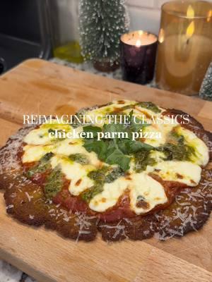 if you love chicken parm & you love pizza, you’ll be a big fan of this! a  delicious spin on the classic that is fun to make and eat🍝🍕🌿 Ingredients (makes small 2 pizzas) - 2 large cans of chicken - 1 tsp each of Italian seasoning, salt, pepper, garlic powder, onion powder - 1 egg - 1/3 cup grated parmesan  - breadcrumbs (enough to cover - about 2 cups) - frying oil - vodka sauce - mozzarella cheese - basil pesto - fresh basil #chickenparm #chickenparmrecipe #pizzarecipe #chickenparmpizza #homechef #cookwithme  #mealinspo #DinnerIdeas #chickenrecipe #highprotein #asmrfood #stepbysteprecipe #creatorsearchinsights 