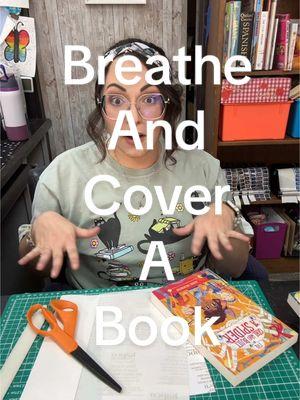 When things feel out of our control, we take deep breaths. In my case, I cover books. #schoollibrarian #librariansoftiktok #librarytok #librarylife #bookcover #paperbackprotector 