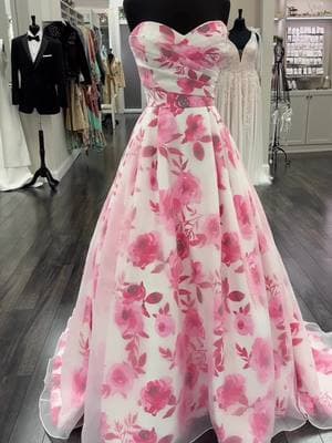 💗New dress alert!💗These sweet floral gown is giving us rosey vibes and we can’t wait to see it on our brides. Tap the link in our bio to set up your appointment and be one of the first to try it on ✨ #wedding #weddingdress #bridetobe #centralny #upstatewedding #pinkwedding #syracuseny 