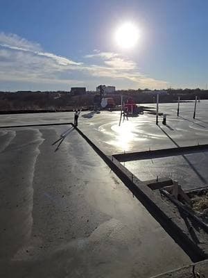 This slab is top notch. Great finish work. Beautiful edges where we have drops. It's a great product. Now it's time to get the forms off, grade this dirt around this slab so it drains. Bring gravel in for this garage area for our lumber so we can be organized. Pop off where these walls go. Get this house framed. Should have some walls end of next week. Let's see how it goes with getting this area cleaned and graded like it needs to be so we can work diligently and organized where things make sense. Love this family so let's give them our very best. #jimmylambert #luxurybylambert #ginabefly #jlambertcustomhomes #lambert #claffeypools #dreamhone #elite #Kickingass #luxuryaf #Frisco #soils #trump #luxury #goodbye2024 #foryou #foryour #foryoupage❤️❤️ #foryoupageofficiall #capcut #