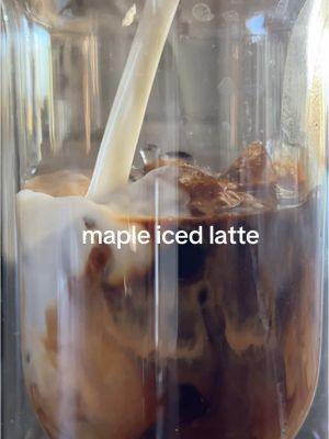 frothy maple iced latte  Maple Iced Latte Recipe 2 shots of espresso perfectly sweet (but not too sweet) maple iced latte How to Make Maple Iced Latte • Double Shot Espresso • Ice • Whole Milk (any milk works) • Dash of Maple Syrup (frothed with milk to blend it) • Cocoa Powder #icedlatte #maplelatte #coffeetiktok #espressomachine if you have an espresso machine you have to try this recipe!