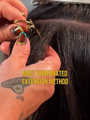 I-tip Extensions are definitely underrated and deserve more attention for their versatility and benefits. Here’s why they stand out: 1. No Heat or Glue I-tips are installed using a bead-and-clamp method, which means no heat, glue, or chemicals are involved. This makes them a safer option for natural hair. 2. Flexible Styling Because the extensions are installed strand by strand, they move naturally and allow for more flexible styling compared to wefts or tapes. 3. Long-Lasting With proper care and maintenance, I-tip extensions can last 6–8 weeks before needing a touch-up. 4. Reusable The strands can be reused multiple times, making them a cost-effective choice in the long run. 5. Great for Fine Hair I-tips work well for clients with fine hair since the beads distribute weight evenly and don’t put as much tension on the roots. 6. Customizable Placement Stylists can strategically place I-tips for volume, length, or even highlights, making them ideal for a personalized look. Despite these benefits, they often get overlooked in favor of tape-ins or keratin bonds. Highlighting these advantages can help educate clients and boost demand! @bellamihairpro @bellamihair  @777miamisalon  #designerhairenhancements #bellamihair #bellamihairpro #miamihairextensions #itipextensions #bellamimiami #miamiextensions 