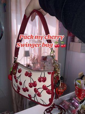 Pack my cherry swinger bag 🍒🍒🍒 @Coach  #coach #coachbag #coachpurse #coachswinger #swinger #whatsinside #whatsinmypurse #purse #pursetok #pursecollection #cherry 