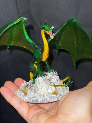 Translucent emerald dragon 🐉💚 I added a fun flair to the base#dnd #dnd5e #dungeonsanddragons #dndminiatures #dndtiktok #dndtok #mini #miniature #minipainting #paint #dragon #green #emerald #clear #translucent #r#rock