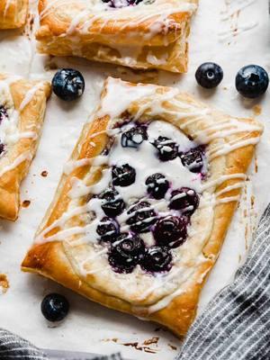 Skip the bakery and make these gourmet blueberry danishes at home!  These pastries are made with store bought puff pastry so they can be ready in  30 minutes!    Click the Linktree link in my profile to grab the recipe🫐 #bakersofinstagram #madefromscratch #snacks #food #parties #saltandbaker #desserts #baking #weekendbaking #pastries #blueberry #puffpastry #easybreakfast #danish #blueberrydanish #pastrycream #homemadepastries  https://saltandbaker.com/blueberry-danish-recipe/