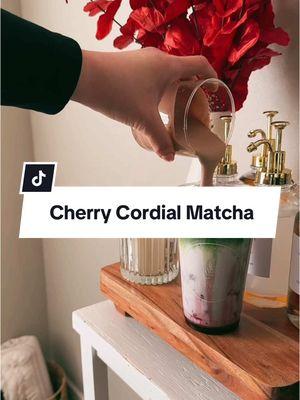 Cherry Cordial Matcha Latte 🍒🌿✨  Matcha @matchakari  Chocolate sauce @Ghirardelli Chocolate Company  Recipe  3 scoops matcha  1.5 oz warm water  Ice  1.5 oz Cherry vanilla syrup  1 cup milk Cold foam 3 tbsp heavy cream 2 tbsp milk 1 tbsp chocolate sauce  #cherrycordialmatchalatte #cherrycordial #cherrymatcha #chocolatematcha #matcha #matchalatte #matcharecipe #matchatok #cherryvanillalatte #icedlatte #coffeeathome #homecafe #cafelivcakes #livcakesvalentines #livcakes #Recipe #coffeebar #easydiy #tiktokban #ValentinesDay 