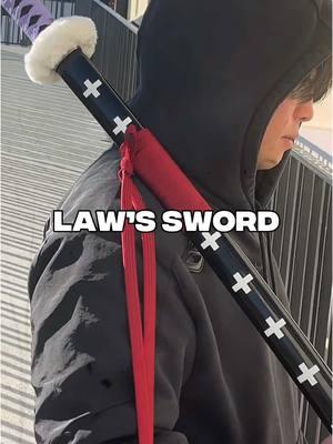 NEW! 🔥 lore and size accurate Trafalgar Law’s non-functional sword. Available now in store and online at katachisf.com, supplies limited so don’t wait. 🔥 🔥 Trafalgar D. Water Law, more commonly known as just Trafalgar Law (トラファルガー・ロー, Torafarugā Rō) and by his epithet as the “Surgeon of Death”, is a pirate from the North Blue and the captain and doctor of the Heart Pirates. He is one of twelve pirates who are referred to as the “Worst Generation”. He became one of the Seven Warlords of the Sea during the timeskip, but his position was revoked for allying with the Straw Hat Pirates. Law, like many other pirates, dreams of finding the One Piece, while also desiring to know the purpose of the Will of D. 🔥 we ship all over the US and give free shipping to orders over $49. This excludes Alaska and Hawaii. #KatachiSF #OnePiece #TrafalgarLaw #LawSword #OnePieceLaw #OnePieceFan #AnimeStore #AnimeShop #AnimeOnePiece 