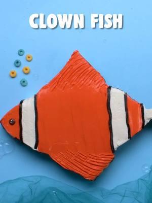 Transform a basic cake into a swimmingly sweet clownfish! 🐠🎂 #soyummy #cakeshaping #cake #cakedecorating #findingnemo #pixar #disneypixar #favoritemovies #kidsmovies #kidsbirthday #birthdaycake #creativecake #underthesea 