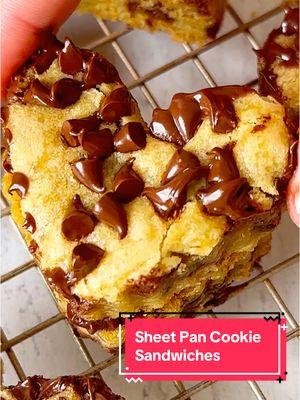 Sheet Pan ♥️ Shape Cookie Sandwiches 💌🍪 These chocolate chip ganache cookie sandwiches are so good and easy to make! Perfect for any Valentine’s or Galentines Day get together.  Full recipe Inc caption.  Ingredients: Cookie:  * 1 cup unsalted butter, melted * 1/2 cup granulated sugar * 1 1/4 cup packed brown sugar * 2 large eggs, room temp  * 1 1/2 tsp pure vanilla extract * 3 cups all-purpose flour * 1 tsp baking soda * 1/2 tsp salt * 1 cup mini chocolate chips, separated  Ganache:  * 2, 4 oz, chocolate bars, chopped * 1/2 cup heavy cream, heated  Instructions: * Preheat oven to 350°F.  * Place melted butter in a medium bowl. Add both sugars and mix on low speed till smooth. Mix in eggs and vanilla extract till combine. Mix flour, baking soda and salt salt together and slowly mix in flour, 1/2 cup at a time. Mix in 3/4 cup chocolate chips.  * Using an ice-cream scooper place dough on to parchment cookie sheet and spread and flatten dough out. Sprinkle remaining chocolate chips on top. Set aside. * Make the ganache by pouring hot heavy cream over chopped chocolate and stir till smooth. Let it sit out to thicken or put in the fridge to thicken.  * Put cookie sheet into the oven and bake for 20 minutes. Remove and cool. * Once cooled using heart shape cookie cutter, cut cookies out of sheet. * Place ganache into piping bag and pipe onto bottom of cookie and put another cookie on top. Enjoy! #heartshaped #heart #hearts #bemine #valentines #ValentinesDay #galentiens #cookies #chocolatechipcookie #cookiemonster #cookie #cookielover #cookiedough #dough #chocolatechips #mini #food52community #chocolatechipcookies #heartcookie #ganache #chocolate #chocolates #bitesize #galentine #Love #loveyou #baker #weekend #cookiesandwich #sandwich #cookiecutter 