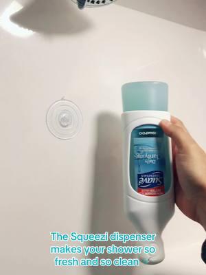 The silicone sleeve fits most 10-18 oz bottle shapes #sofreshandsoclean #showerwithsqueezi #shampooandconditioner #organizedhome #clean 