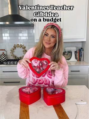 Valentines Teacher Gift idea for only $30! I found everything for this gift idea from Walmart and knew once I saw this red heart tin that I could do something super fun with it! ❤️ if you want, you can also add a gift card to the tin to top it off— I feel like budget wise, this decision is decided based off how many teachers your kids have  🤪 #valentines #vday #vdaygifts #teachergifts #teachergift #valentinesgifts #giftguide #teachergiftideas #diyvalentines #diyteacher #valentinesideas #walmartfinds #walmart 